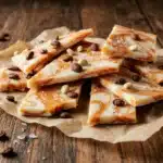 Swirled white chocolate pumpkin spice latte bark topped with seeds and espresso