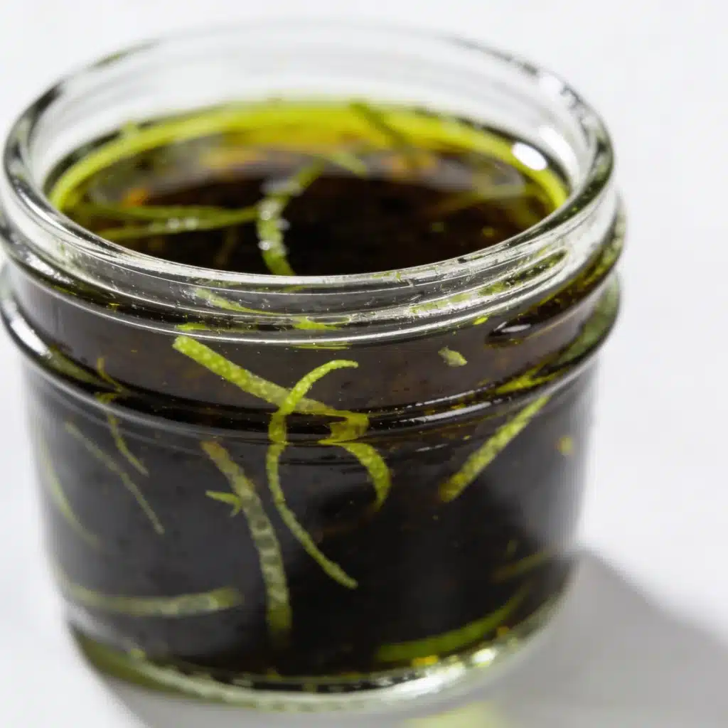 A small jar of balsamic lime dressing for a healthy watermelon feta salad.