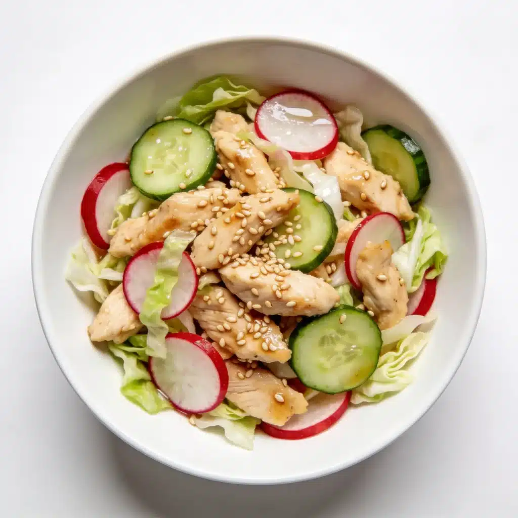 Sesame chicken salad with radishes and cucumbers.