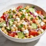 The complete mediterranean chickpea salad ready to eat.