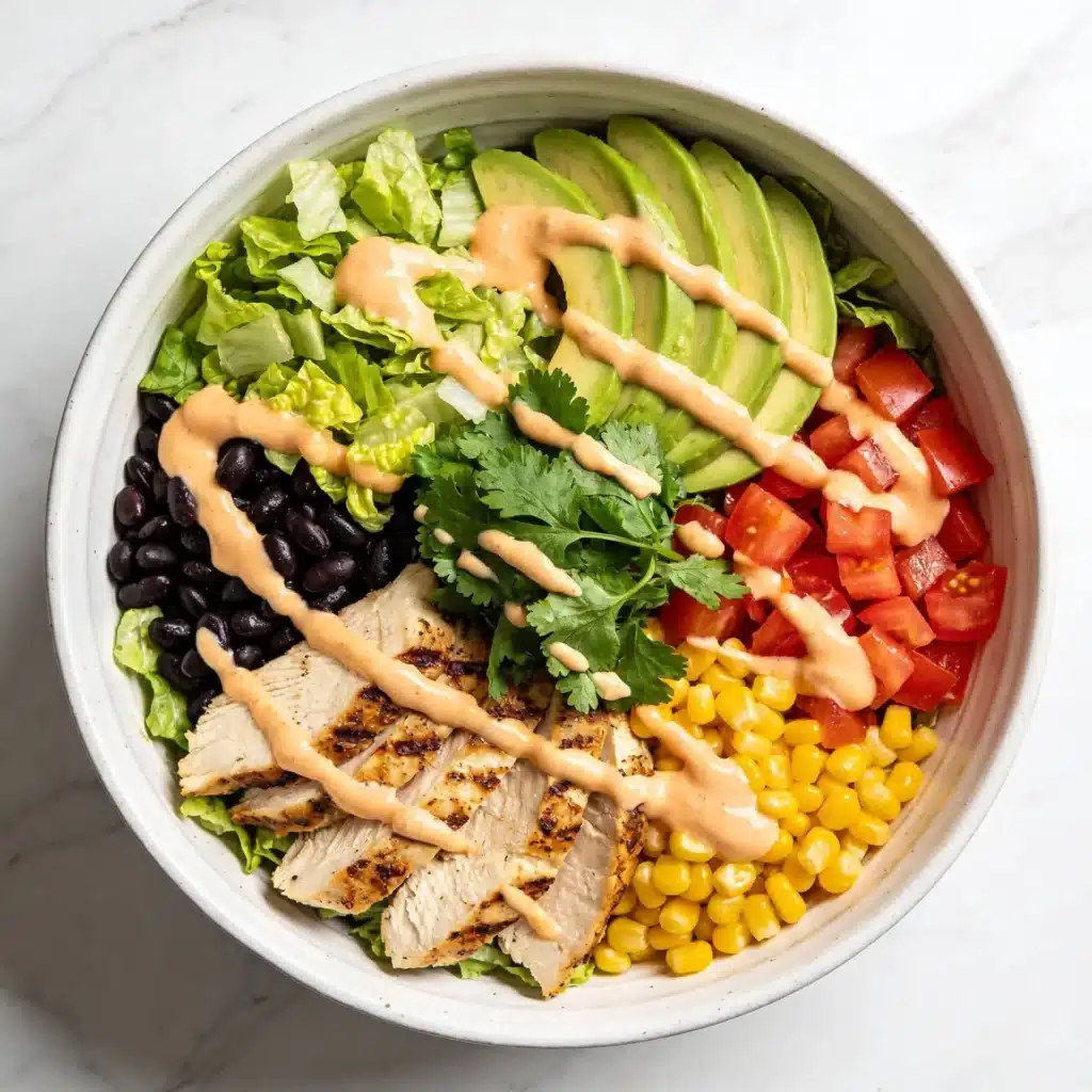 High protein southwest chicken taco salad with corn and beans.