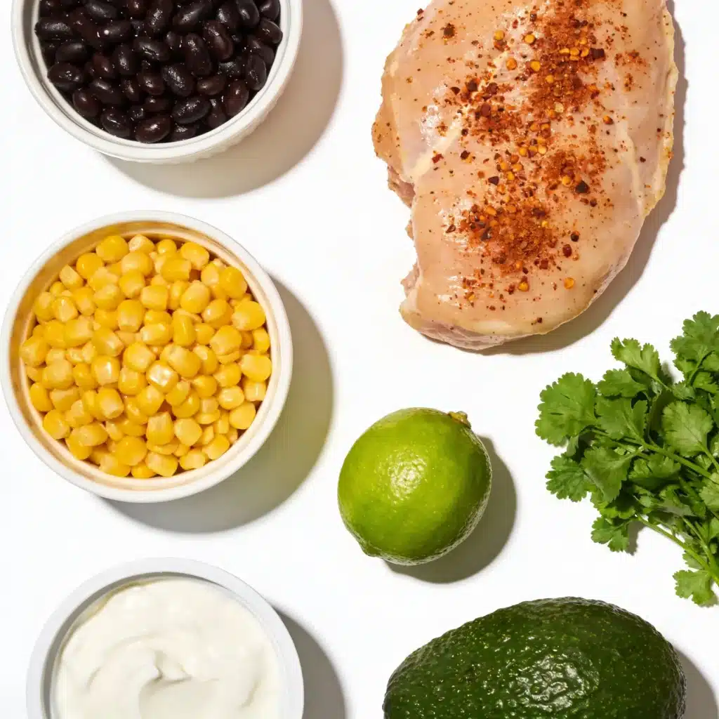 Ingredients for southwest chicken salad including corn and beans.
