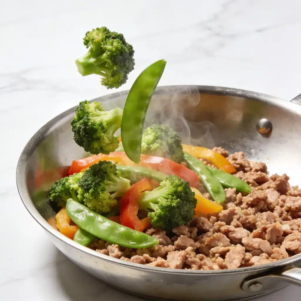 Flash-steaming vibrant vegetables for an anti-inflammatory ginger garlic dinner.