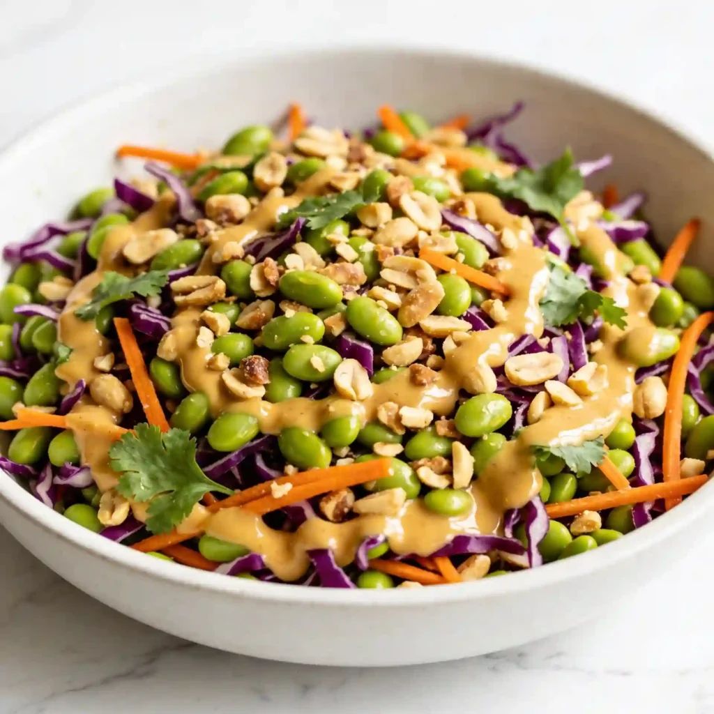 A large, beautiful serving of high protein vegan edamame salad ready to be enjoyed.