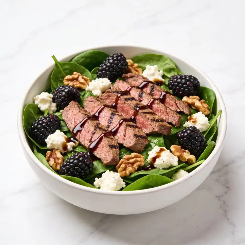 A variation of the blackberry salad featuring lean steak strips.